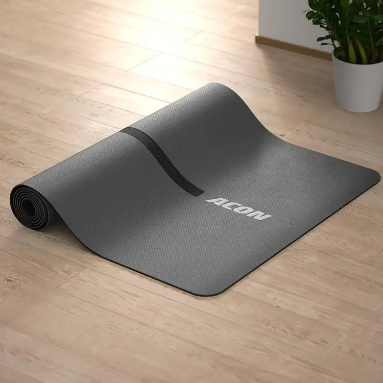 acon-fit-4mm-yoga-mat-detail-partially-rolled-on-the-floor