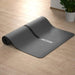 acon-fit-4mm-yoga-mat-detail-partially-rolled-on-the-floor