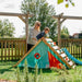 adult-supporting-child-on-triangular-playcentre-climbing-ramp-in-garden
