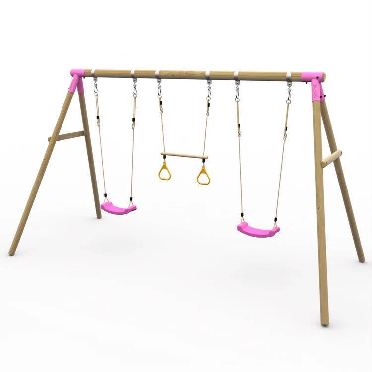 angled-hero-shot-of-wooden-mangabey-swing-set-with-pink-accents-two-pink-seats-and-a-center-trapeze-bar-with-yellow-rings