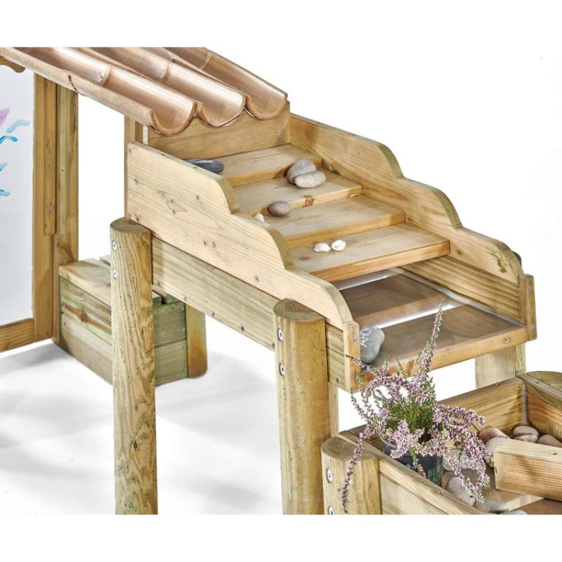 angled-view-of-stepped-wooden-water-run-section-with-bamboo-channels-clear-panel-and-planter
