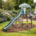 backyard-jungle-gym-with-spiral-climber-slide-and-kids-at-play-near-patio