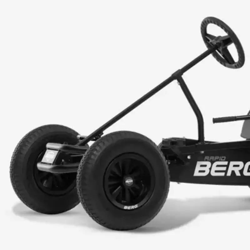 berg-duo-coaster-go-kart-front-wheels-and-steering-wheel-detail-with-brand-name-print-on-the-frame
