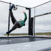 boy-kicks-acon-trampoline-soccer-goal-panel-outside-setup