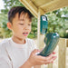 boy-using-toy-play-telephone-inside-wooden-lookout-tower