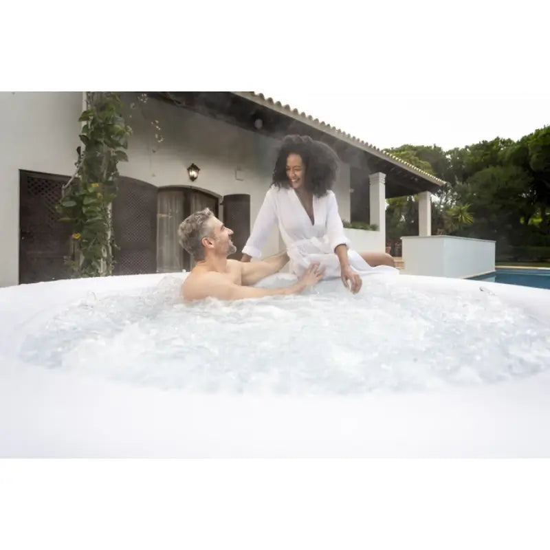couple-enjoying-cancun-lazy-spa-water-bubbles-from-airjets