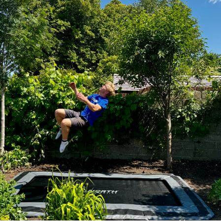 child-bouncing-on-north-rectangular-inground-trampoline-without-safety-net