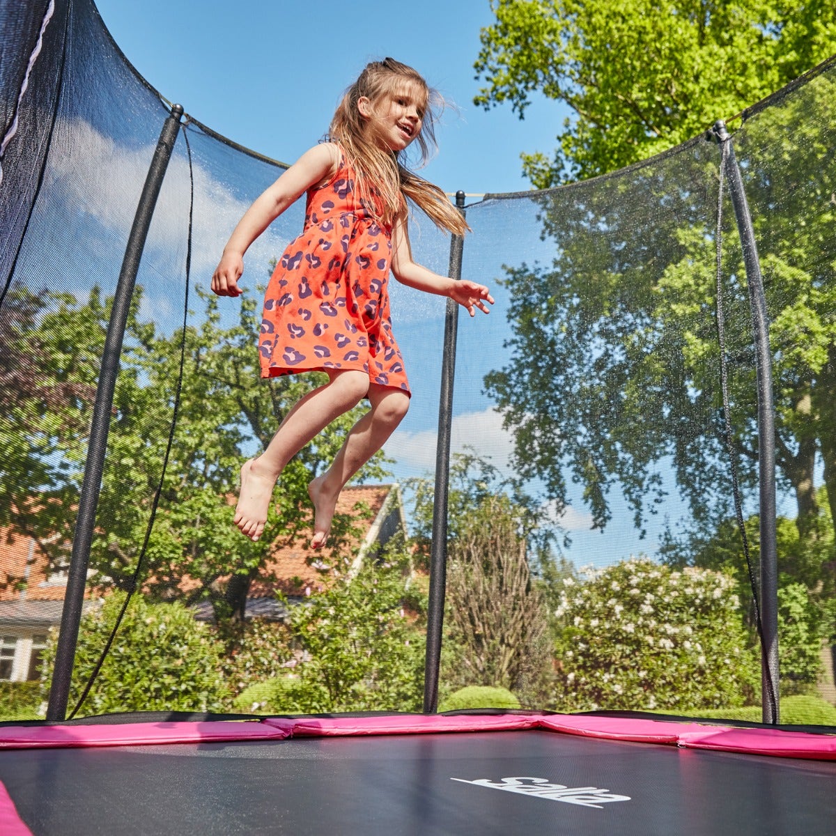 child-bouncing-on-salta-pink-rectangular-comfort-edition-trampoline