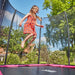 child-bouncing-on-salta-pink-rectangular-comfort-edition-trampoline