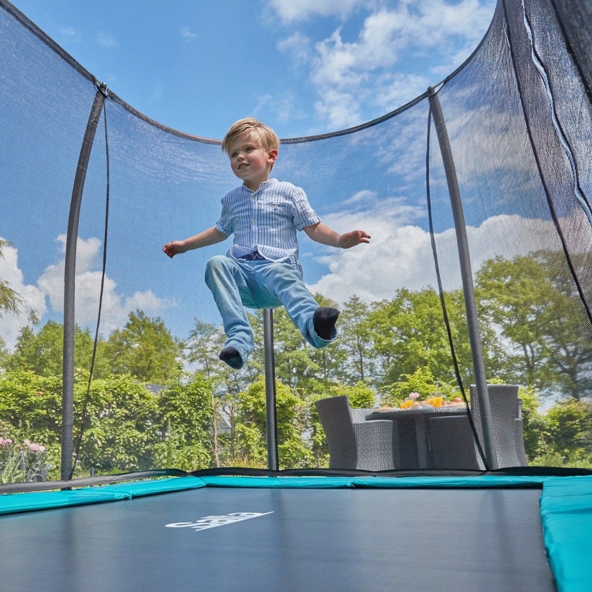 child-bouncing-on-salta-rectangular-trampoline-with-safety-net