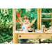 child-creating-paint-handprints-on-plum-discovery-kitchen
