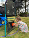child-feeding-soft-ball-through-lower-target-panel
