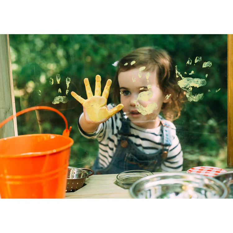 child-making-handprint-on-plum-discovery-mud-pie-kitchen