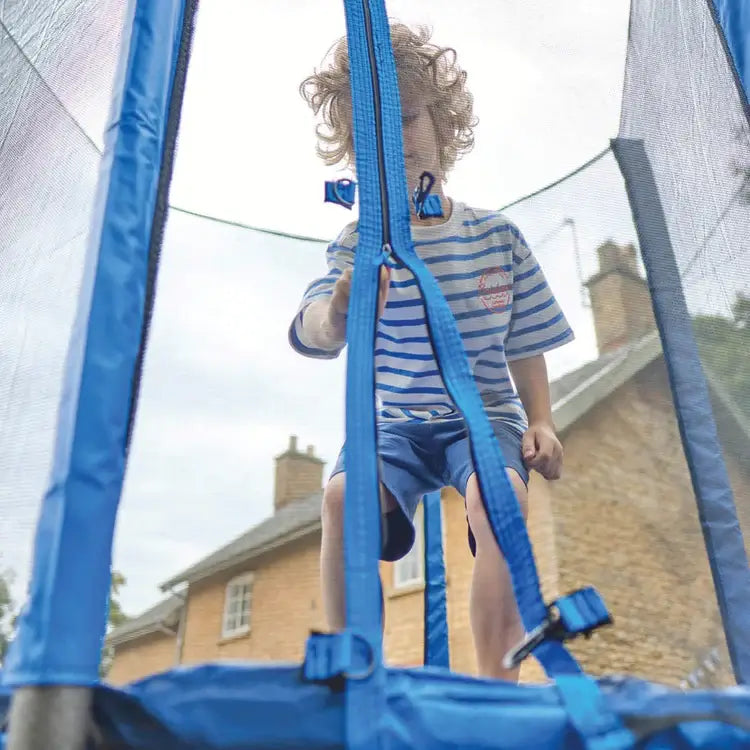 child-opening-blue-trampoline-net-entrance-from-inside