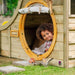 child-peeking-out-of-round-door-on-plum-discovery-nature-play-hideaway