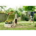 child-playing-beside-curved-wooden-garden-hideaway-with-grass-roof-and-sunflower-planter