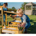 child-pouring-water-through-tiered-trays-on-a-wooden-water-run