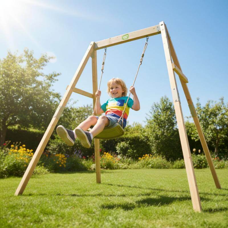 child-riding-exit-toys-silvi-wooden-swing-frame-in-backyard