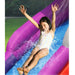 child-sliding-down-wet-inflatable-shark-slide