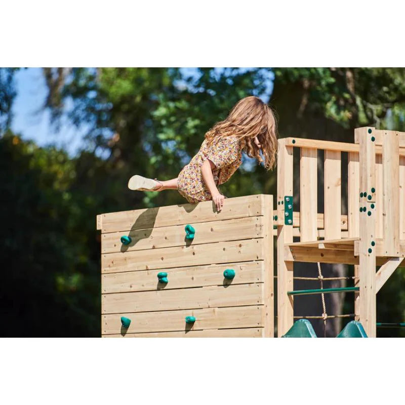 child-standing-at-the-top-of-a-plum-wooden-rock-climbing-wall-extension-main