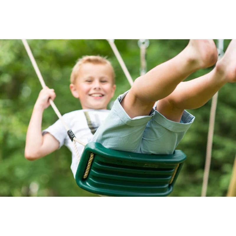 child-swinging-on-green-belt-seat-on-plum-uakari-wooden-swing-set