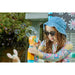 child-using-bubble-blaster-on-plum-play-water-park-shower-tower