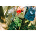 child-watering-planter-at-plum-discovery-mud-pie-kitchen