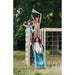 children-cheering-on-top-of-plum-wooden-climbing-cube-with-girl-going-down-the-slide