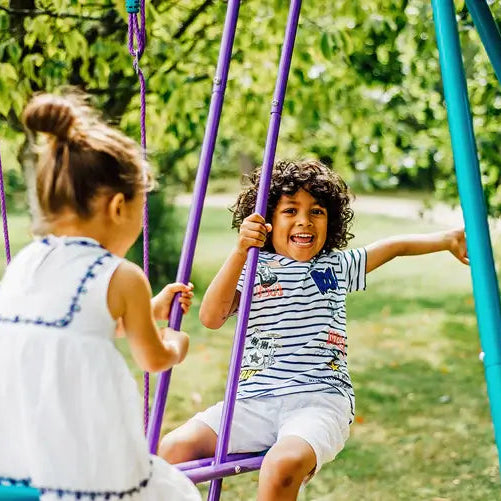 children-playing-on-plum-jupiter-swing-glider