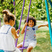 children-playing-on-plum-jupiter-swing-glider