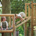 children-playing-on-wooden-adventure-playcentre-with-rope-ramp-and-raised-platform