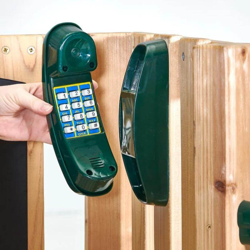 childs-toy-telephone-handset-and-holder-mounted-on-wooden-playcentre