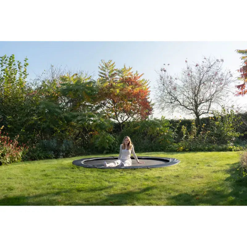 chilling-on-exit-toys-in-ground-trampoline-305cm-black