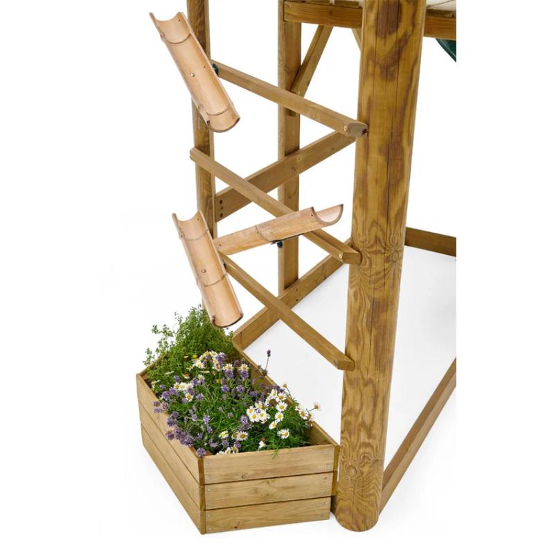 close-up-of-bamboo-bug-hotel-under-wooden-playcentre-platform