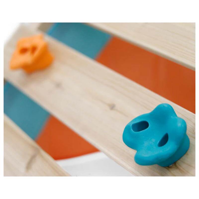close-up-of-blue-and-orange-climbing-holds-on-wooden-playcentre-ramp