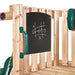 close-up-of-chalkboard-panel-inside-wooden-playcentre-with-green-handles