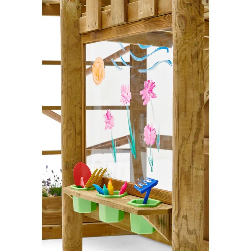 close-up-of-clear-drawing-panel-with-painted-flowers-and-garden-tool-shelf