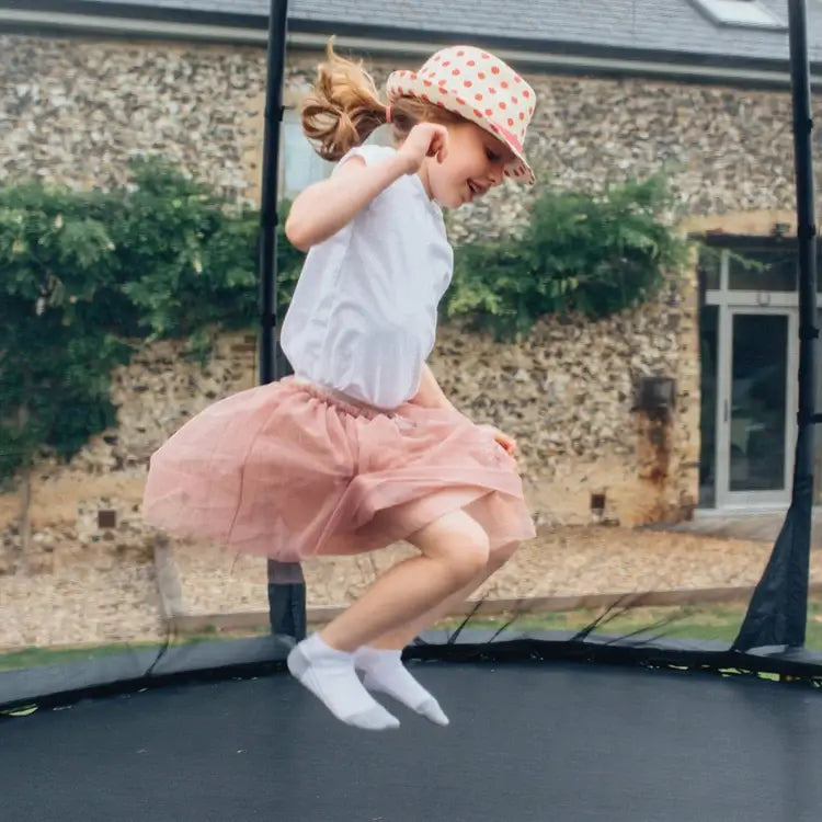 close-up-of-girl-jumping-on-plum-magnitude-trampoline