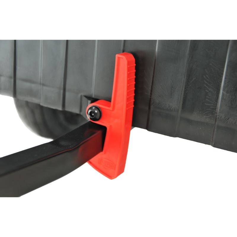 close-up-of-red-tipping-handle-on-a-black-pedal-go-kart-trailer
