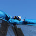close-up-of-trampoline-enclosure-top-connector-and-blue-trim