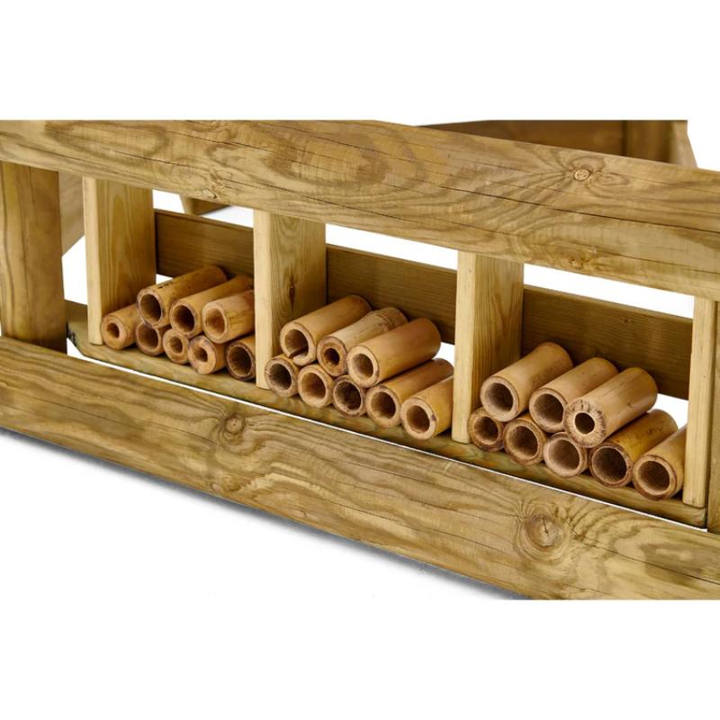 close-up-of-wooden-bug-hotel-compartments-under-playcentre-platform