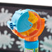 close-up-view-of-water-flowing-from-a-blue-plastic-spout-into-the-main-basin-of-the-splash-station