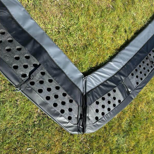 corner-detail-of-north-rectangular-inground-trampoline-padding-and-vented-edge