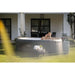 couple-relaxing-in-lay-z-spa-mauritius-hot-tub-placed-on-grass