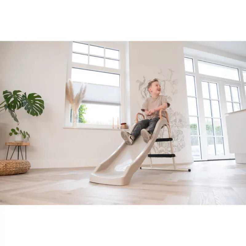 lifestyle-shot-of-exit-my-first-indoor-kids-slide-with-kid-sliding