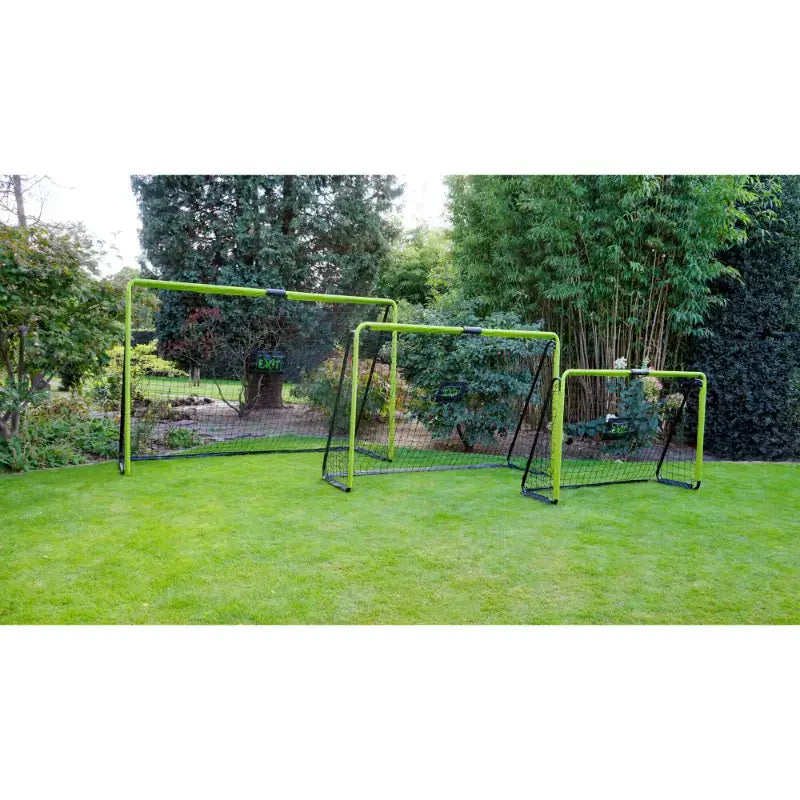 Lifestyle shot of EXIT Tempo football training goals with different sizes placed on grass.