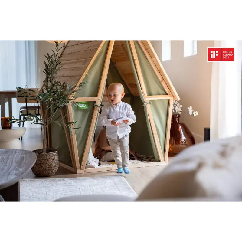lifestyle-shot-of-exit-yuki-indoor-wooden-playhouse-with-toddler