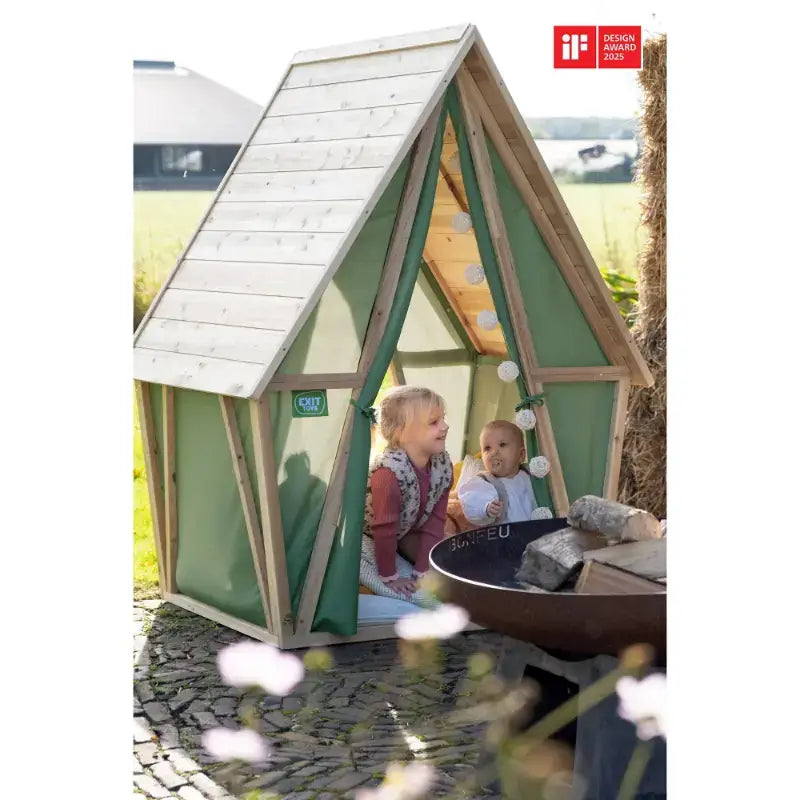 lifestyle-view-of-exit-yuki-wooden-outdoor-playhouse-installed-on-ground