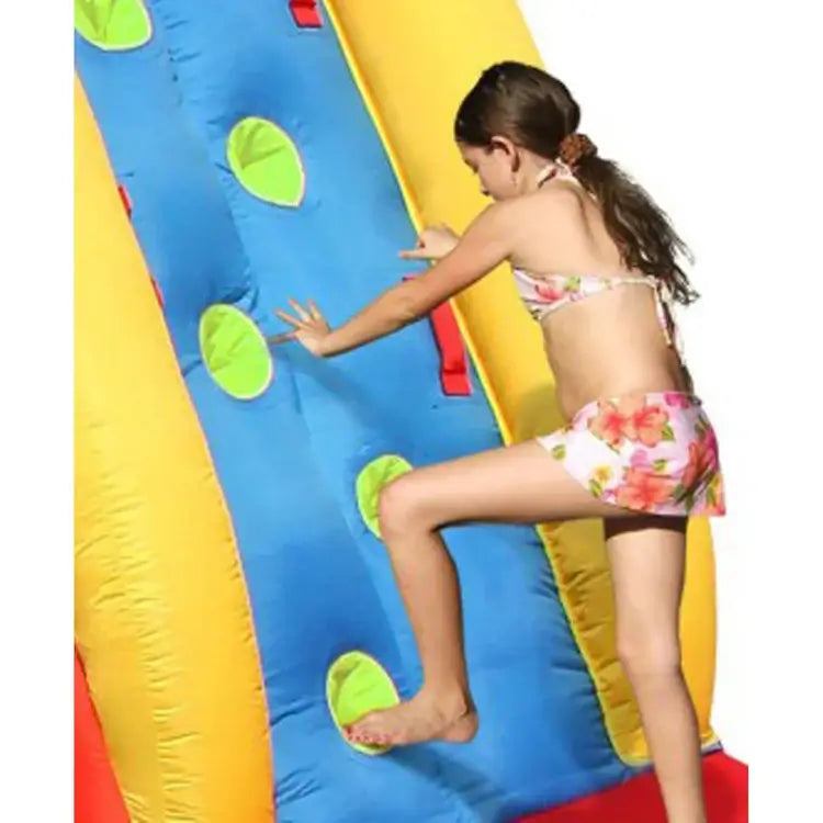 girl-climbing-inflatable-wall-on-shark-themed-water-slide