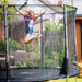 girl-jumping-inside-plum-spacezone-ii-evolution-trampoline